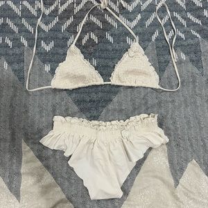 Frankie’s Bikinis off-while with flowers